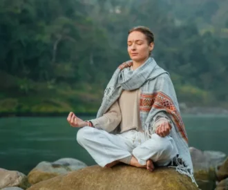 Outdoor Hatha yoga session in the nature of Rishikesh.