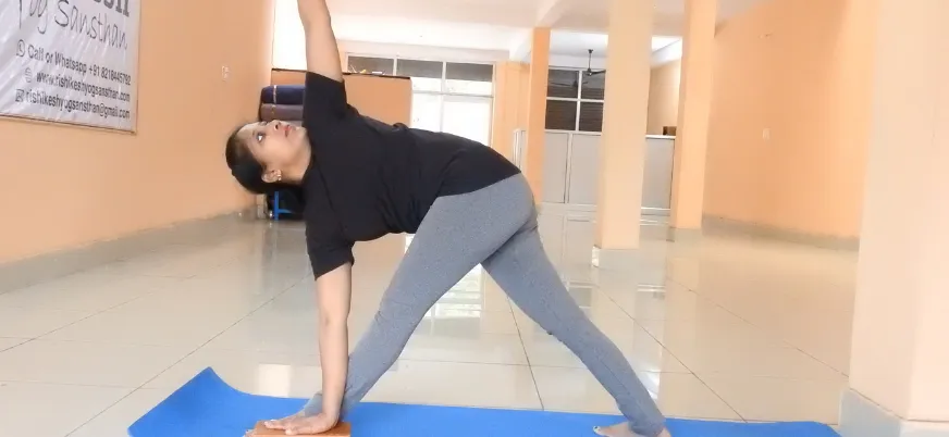 Learning Ashtanga Vinyasa sequences in the 200-hour YTTC in Rishikesh.