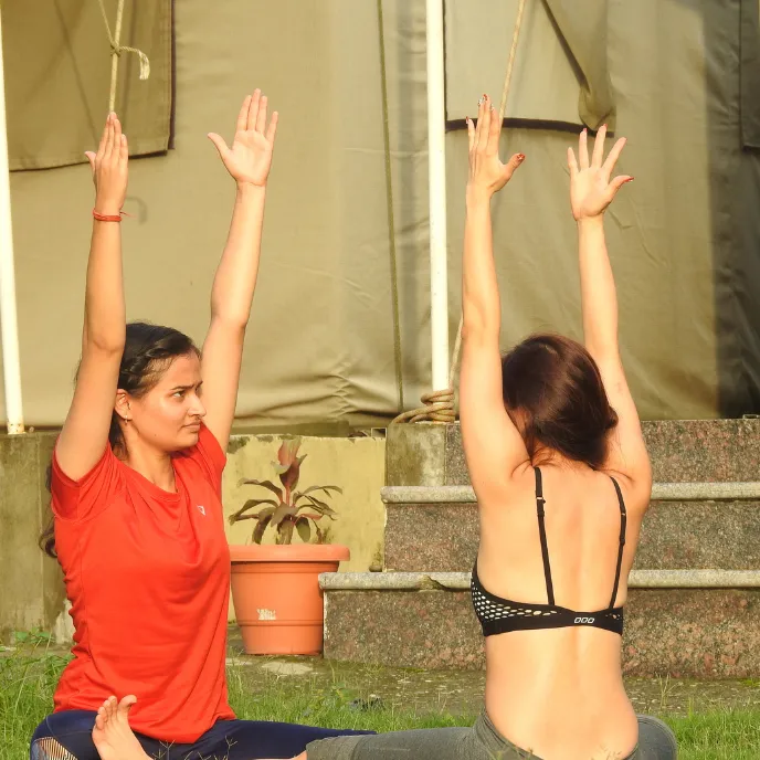 A serene view of the Anagha Yoga School building in Rishikesh, India.